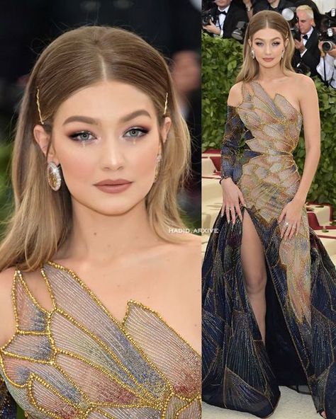 sara 🪽 on Instagram: "Metgala 2018: “Heavenly Bodies: fashion and the catholic imagination” ✨🍸 Gigi hadid ‘s angelic look in Versace gown that resembled stained glass windows. 🤍  @gigihadid | #metgala #inspo #versace #gigihadid #stainedglass #makeup #hairstyle #explore" Gigi Hadid Met Gala, Best Met Gala Looks, Heavenly Bodies Fashion, Versace Gown, Full Gown, Met Gala Dresses, Heavenly Bodies, Peacock Dress, Makeup Hairstyle