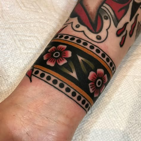 Traditional Cuff Tattoo, Ankle Cuff Tattoo, Traditional Tattoo Man, American Traditional Sleeve, Cuff Tattoo, Traditional Tattoo Inspiration, Traditional Tattoo Flowers, Neotraditional Tattoo, Traditional Style Tattoo