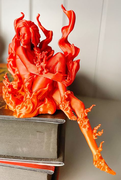 "GORGEOUS!  Crescent City inspired Lehabah Replica!   This fire sprite is stunning in this red/orange/gold color!   3D printed in this cute sitting position, perfect to sit on your books or bookshelf.   Sits about 3.5\" tall.  Models will be printed to order.  Please allow time for the items to be made and perfected. Original Design by The Artifact Workshop" Fire Sprite Crescent City, Acotar Dresser, Lehabah Crescent City, Fire Sprite, Tall Models, Fun Drinking Games, 3d Printing Diy, Sarah J Maas Books, Cute Presents