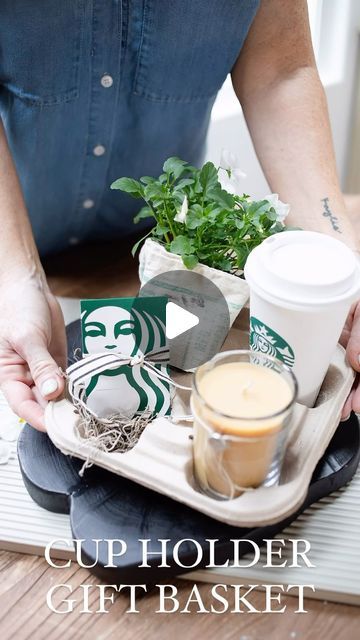 Melaine Thompson on Instagram: "RUUUUNNNN to your nearest coffee stand and grab a to go cup holder, Mom’s favorite drink, and a gift card.  Add potted or fresh flowers and a yummy candle!   Voila, the perfect unique Mother’s Day gift!   Here are some other creative things you could add to this gift basket.  Face mask  Sephora or Ulta gift card Cozy socks rolled up Perfume Body scrub Lip gloss Scrunchies Body butter Dish towel Measuring cups  Mini wine or champagne bottles  Tumbler or Stanley Chocolate  Sunscreen  Lotion Hairspray   PRO TIP- Make sure each item fits in each cup holder. I took mine with me when I was out shopping!   #giftsformom#mothersday#momsfavoritethings#momdayinspiration#uniquemomgifts#oneofakindgifts#mothersdayinspo" Cup Carrier Gift Ideas, Drink Holder Gift Basket, Cup Holder Gift Basket, Cup Holder Gift Idea, Cup Holder Bouquet, Gifts In A Cup, Cup Gift Ideas Filled, Flower Gift Card Holder, Drink Holder Diy