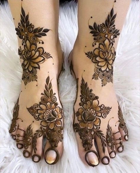 Certainly! Foot mehndi designs are a captivating form of body art that adorn the feet with intricate patterns and motifs. Whether for weddings, festivals, or everyday wear, these designs add a touch of elegance and cultural flair. Let’s explore some popular foot mehndi designs:  Traditional Paisley Patterns: These timeless designs feature paisley motifs, flowers, and leaves. They often extend from the toes to the ankles, creating a beautiful flow Mehndi Designs Traditional, Foot Mehndi Designs, Foot Mehndi, Leg Mehndi, Foot Henna, Henna Tattoo Designs Hand, Legs Mehndi Design, Beautiful Henna, Rose Mehndi Designs