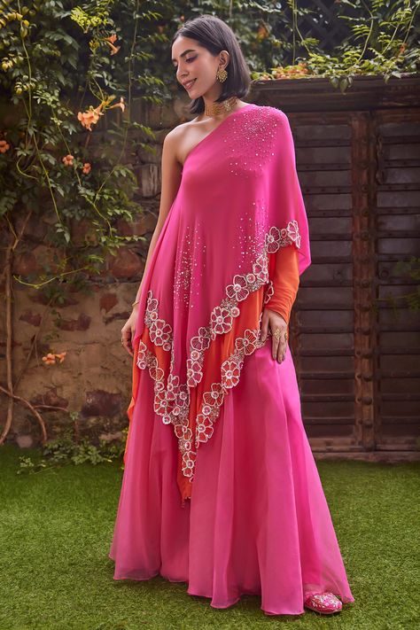 Shop for these amazing collections of Pink Cape Georgette Hand Embroidered Floral One Shoulder Skirt Set For Women by Label RSD online at Aza Fashions. Organza Indian Outfits, Organza Suits Indian, Orange And Pink Outfit, Cape Dress Indian, Off Shoulder Cape, Cape Skirt, Drape Sarees, Silk Kurti Designs, Choli Dress