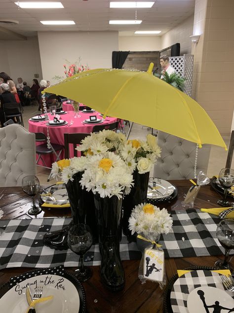 Singing in the rain table scape Dancing In The Rain Party Theme, Singing In The Rain Decorations, The Rain Movie, Movie Party Decorations, Grad Table, Banquet Table, Ministry Ideas, Women's Ministry, Table Scape