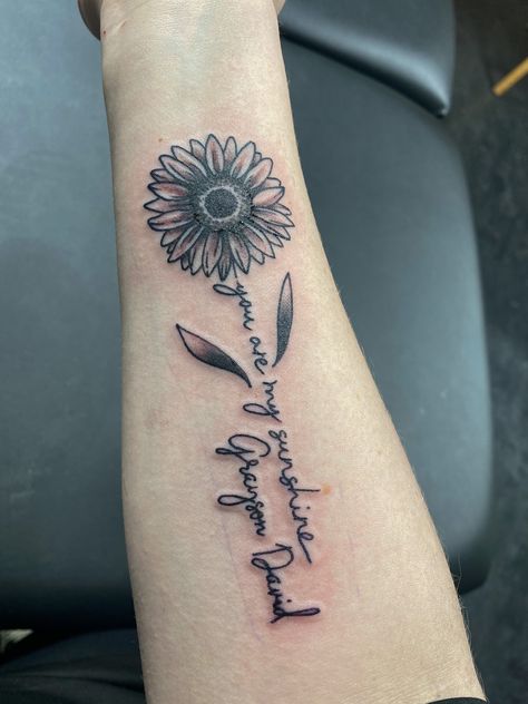 Sunflower Tattoo With Words As Stem, Sunshine Arm Tattoo, Sunflower Signature Tattoo, Sunflower With Writing Tattoo, Sunflower Bible Verse Tattoo, Granddaughters Tattoo Ideas, Sunflower Memorial Tattoo Mom, Sunflower Tattoo With Name In Stem, You Are My Sunshine Memorial Tattoo