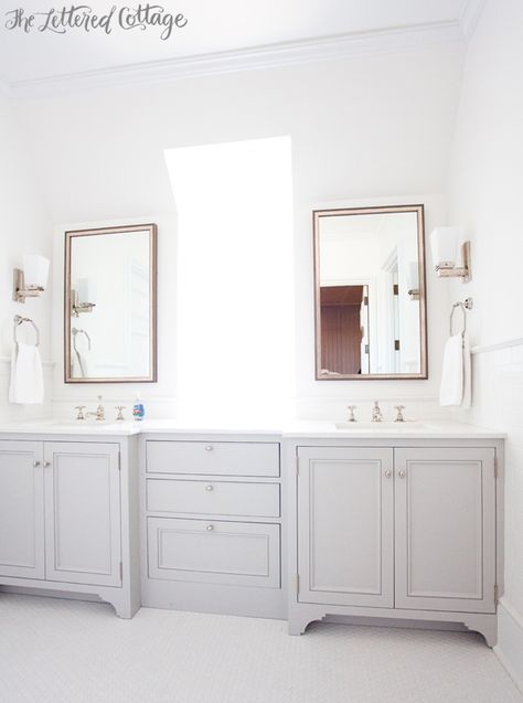 Bathroom | Double Vanity | Gray | White | Window | Phillip Sides Interior Design | Portis Home Painted Double Vanity, Double Vanity With Window In Middle, Bathroom Gray Cabinets, Vanity With Window, Vanity Window, Masterbath Ideas, Florida Bathroom, Bathroom Gray, Lettered Cottage