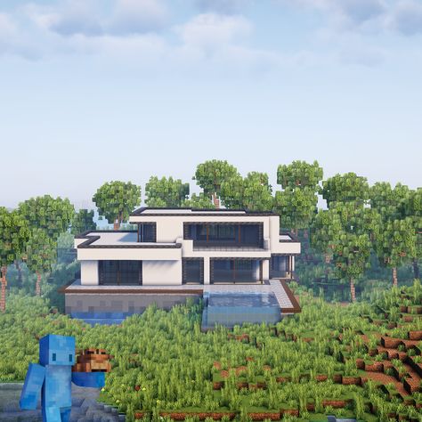 Made this big mansion in modern style. I would actually really like to live in such a modern house surrounded with some nice trees. Big Mansion, Big Mansions, A Modern House, Minecraft Modern, Famous Buildings, Big House, Modern Mansion, Mansion, Modern Style