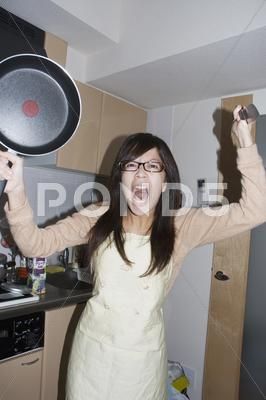 Woman screaming whilst holding kitchen knife and frying pan Stock Photos #AD ,#holding#kitchen#Woman#screaming Someone Holding A Knife, Person Holding Knife Reference, Woman Holding Knife, Person Holding Knife, Woman Screaming, Memory Art, Life Reference, Knife Drawing, Angry Women