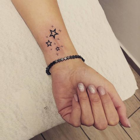 Considering a small wrist tattoo? We have pictures of dozens of tiny wrist tattoos to inspire your next design. Best Star Tattoos, Star Tattoo On Wrist, Small Star Tattoos, Tiny Wrist Tattoos, Cool Wrist Tattoos, Star Tattoo Designs, Star Tattoo, Tattoos For Black Skin, Small Wrist Tattoos