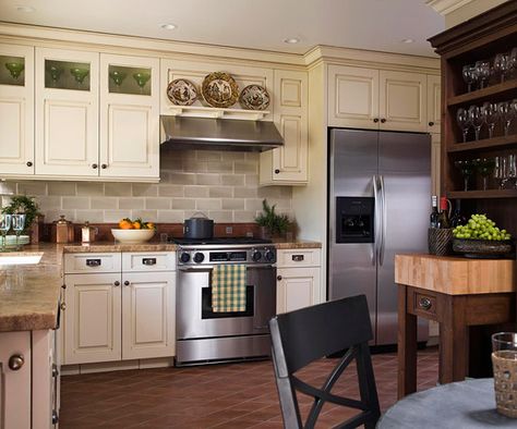 LOVE this kitchen. Vintage glazed white cabinets with granite counters and nice earthy reddish brown tiles. White Cabinets With Granite, Weekend Home Projects, Cream Cabinets, Budget Remodel, Weekend Projects, Stainless Appliances, Updated Kitchen, Kitchen Remodel Idea, Kitchen Makeover