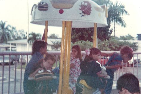 Old McDonalds playground in Bayamon, Puerto Rico. (1993) Merry Go Round Playground, Old Playground, Kiddie Rides, Celebrity Caricatures, Kids Glasses, Orange You Glad, Merry Go Round, Childhood Toys, Retro Decor