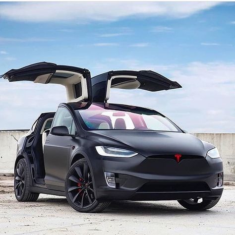 I like the "Back to The Future" style doors on this model. Tesla X, Tesla Roadster, Tesla Motors, Tesla Car, Tesla Model X, Super Luxury Cars, Tesla Model S, Futuristic Cars, Black Car