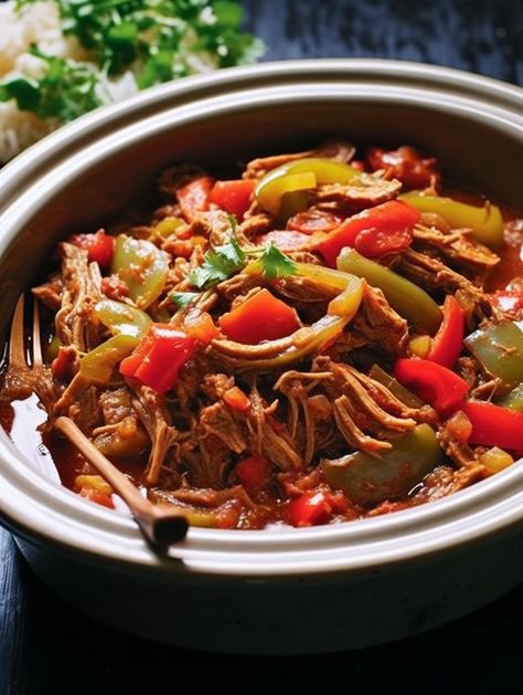 Come on a culinary journey to Cuba with the slow-cooked Ropa Vieja. This vibrant beef stew is packed with succulent shredded beef, a trio of colorful bell peppers, and tender garlic, simmering in a rich tomato-based sauce laced with exotic spices. Crockpot Steak Recipes, Slow Cooker Meat, Crockpot Meat, Skirt Steak Recipes, Crockpot Stuffed Peppers, Slow Cooker Steak, Steak Fajita Recipe, Crockpot Steak, Fajitas Recipe