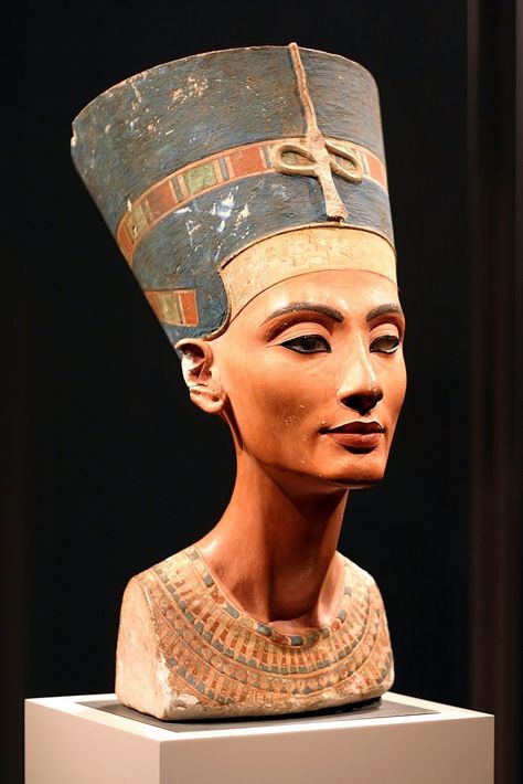 A painted limestone bust of Egyptian Queen Nefertiti, wife of Pharaoh Akhenaten, created over 3,000 years ago; on display in Berlin, Germany Nefertiti Bust, Egypt Queen, Egiptul Antic, Egyptian Queen Nefertiti, Ancient Egypt History, Afrique Art, Queen Nefertiti, Old Egypt, Egyptian Queen