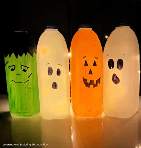 DIY Milk Bottle Halloween Decorations Milk Bottle Halloween Crafts, Halloween Milk Bottle Ghosts, Halloween Milk Bottle Lanterns, Milk Carton Ghosts, Milk Jug Pumpkins, Milk Gallon Crafts, Milk Jug Halloween Decor, Bottle Halloween Decorations, Milk Bottle Decor