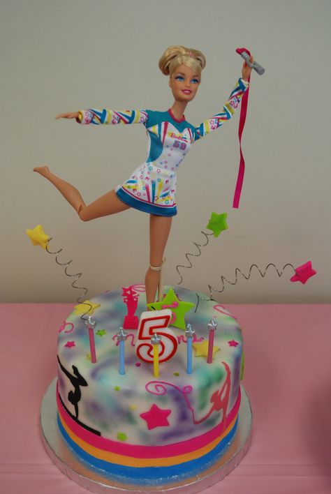 Gymnastics Barbie Cake - by Razzberry Cakes Barbie Gymnastics Birthday Party, Tumbling Birthday Cake, Barbie Gymnastics Cake, Barbie Gymnastics Party, Barbie Gymnastics, Girls Barbie Birthday Party, Gymnastics Birthday Cakes, Gymnastics Cakes, Cake Decorating For Kids