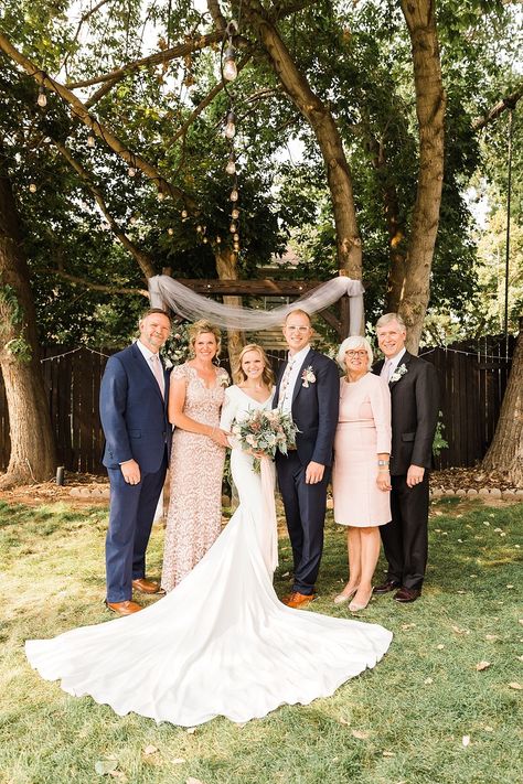 Family pictures at a wedding can be tricky! But as professional Utah wedding photographers, we know all the best big family poses so you won't need to worry about anything. Bride & Groom, Utah wedding photographer, backyard wedding ceremony, outdoor wedding reception, Pritchett Bridal, Floral Love, wedding inspiration, wedding family pictures Wedding Photo Ideas Family, Big Family Poses, Backyard Wedding Ceremony And Reception, Wedding Family Pictures, Wedding Photography Poses Family, Family Wedding Pictures, Backyard Wedding Photography, Wedding Group Photos, Wedding Ceremony Pictures