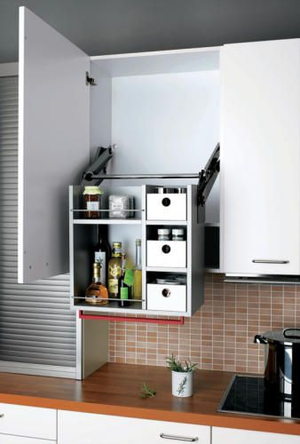 cabinet universal design. wonderful lowering cabinet. when shut it looks totally normal, but anyone can reach it with much more ease. Smart Kitchen Ideas, Accessible House, Accessible Kitchen, Creative Storage Solutions, Kitchen Storage Solutions, Creative Storage, Workplace Design, Design Principles, Universal Design