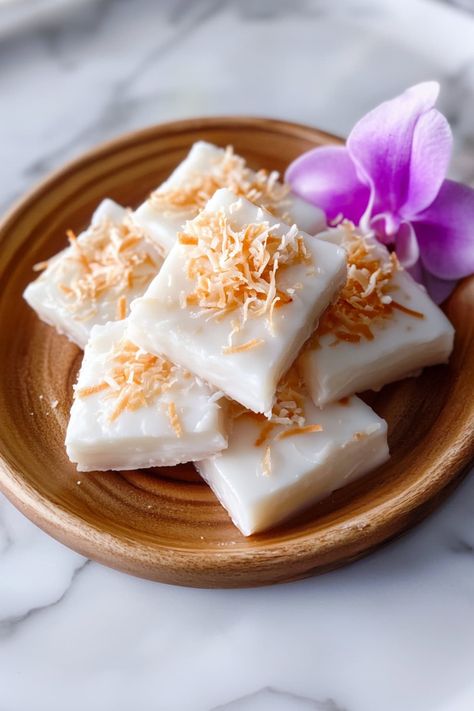 This simple haupia recipe combines rich coconut milk with sugar and cornstarch to create a creamy Hawaiian dessert with plenty of sweet tropical flavor. Haupia Pudding, Pudding Squares, Haupia Recipe, Hawaiian Dessert, Hawaiian Cuisine, Haupia Pie, Hawaiian Foods, Hawaiian Desserts, Hawaiian Recipes