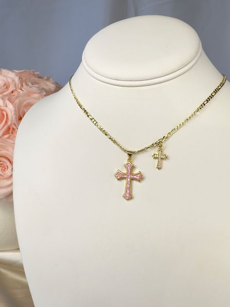 Add a touch of elegance and faith to your jewelry collection with this stunning 14k gold filled double cross necklace. The standout piece features a large cross pendant adorned with shimmering opal shell detailing, complemented by a delicate cubic zirconia cross charm. Perfect for adding a glamorous touch to any outfit, this necklace is sure to make you shine bright wherever you go. Ideal for those who want to showcase their faith with style and sophistication.17.5 inch length with optional 2 in Cross Necklace Pink, Double Cross Necklace, Shell Cross, Cross Pendent, Necklace Christian, Pink Cross, Christian Necklace, Luxe Jewelry, Friendship Jewelry