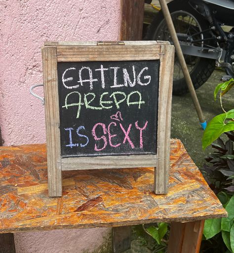 Colombia | Colombian Food | Cafe Sign | Chalk Board | Arepas | Cute Signs | Travel | Minca Colombia Columbian Aesthetic, South American Aesthetic, Cali Colombia Aesthetic, Medellin Colombia Aesthetic, Medellin Aesthetic, Venezuelan Aesthetic, Venezuela Culture, Colombian Aesthetic, Venezuela Aesthetic