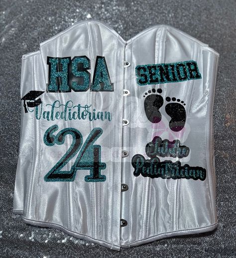 CUSTOM #seniorcorset ! 🎓 done by @jaicreativecollection 🎀 —————————— DM or TEXT (313)318-0114 to place an order📲 ✨ —————————— Available in all colors, schools & sizes! ANY Customization is available 🔥 —————————— #senior2024 #futurernbsn #seniorszn #classof2024 #jaicreativecollection🎀 #casstech #seniorsets #detroitsmallbusiness #ct #customsenioroutfit Cass Tech, Custom Corset, Portrait Outfits, Senior Portrait Outfits, Custom Corsets, High School Graduation Cap, Ultrasound Tech, Cap Decoration, Placing An Order