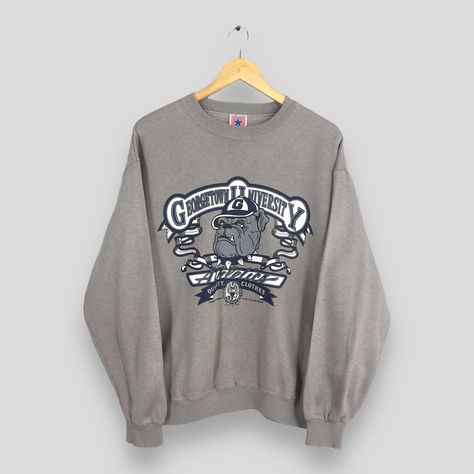 Vintage 90s Georgetown University Gray Sweatshirt Large Georgetown Hoyas Ncaa Printed Crewneck Georgetown University Bulldog Sweater Size L by ZygoticVintage on Etsy Welton Academy Sweatshirt, George Town University, Howard University Sweater, Vintage College Sweatshirt With Logo Print, Georgetown Sweatshirt, Georgetown Hoyas, Georgetown University, Grey Sweatshirt, Sweater Sizes