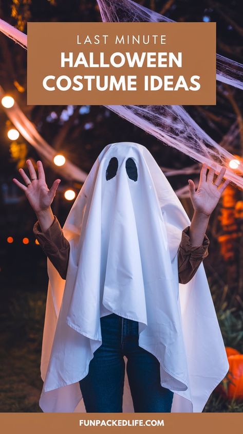 Image shows a person dressed in a classic DIY ghost costume made from a white sheet with cut-out eye holes. The text 'Last Minute Halloween Costume Ideas' is displayed in bold white letters on a brown background at the top. The scene is set outdoors with Halloween decorations like string lights and cobwebs in the background, capturing the spooky and easy-to-make costume for anyone looking for a quick solution. Diy Ghost Costume, Simple Costume Ideas, Last Minute Halloween Costume Ideas, Diy Ghost, Last Minute Halloween Costume, Easy Diy Costumes, Ghost Diy, Last Minute Halloween, Ghost Costume