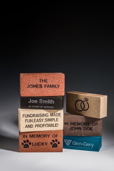 Did you know Glen-Gery offers personalized, engraved bricks? Preserve any person, event, or memory with an engraved brick from Glen-Gery. Or, elevate the personal nature of your walkways or entryway with something truly one-of-a-kind. Engraved Brick is an effective, high-visibility alternative to worn-out, commonplace fundraising methods. #glengery #brickworks #engravedbrick #personalized #personalizedbrick #engraved #gifts #memorial #fundraising #brick #bricks Engraved Bricks Ideas, Brick Fundraiser, Brick Inspiration, Wellness Garden, Brick Companies, Brick Projects, Brick Works, Fundraising Tips, Advertising Gifts