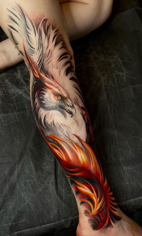 Phoenix Tattoos: Meanings, Tattoo Styles & Ideas Phoenix Bird Back Tattoo, Fenix Sleeve Tattoo, Fire Phoenix Art, Phenix Tattoo For Men, Phoenix Tattoo Meaning Woman, Phoenix Realistic Tattoo, Phoenix Tattoo Man, Masculine Phoenix Tattoo, Men’s Phoenix Tattoo