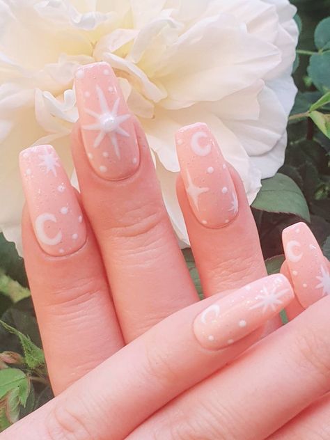 Excited to share this item from my #etsy shop: Pink Shimmer Moon & Stars Press On Gel Nails | Celestial Nails | Reusable #pink #fakenails #white #falsenails #handpaintednails #pressonnails #moonnails #starnails #glitternails Pink Nail With Stars, White Celestial Nails, Pink And White Star Nails, Pink Moon Nails, Star Nails Pink And White, Pink Nails With Moons And Stars, Light Pink Nails With Stars, Pink Nails Gold Stars, Sun Nails