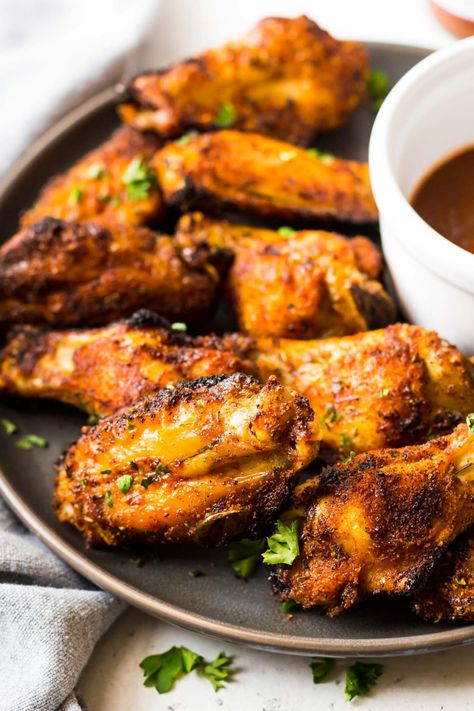 These are the best crispy air fryer chicken wings! They are seasoned with a perfect dry rub and then crisped in the air fryer in just 30 minutes. The whole family will love this easy and healthy recipe. Whole30, Paleo, and gluten free too! #crispychickenwings #airfryerrecipe #airfryerchickenwings Recipe For Air Fryer Chicken, Tandoori Chicken Wings, Chicken Rub Recipes, Dry Rub Chicken Wings, Recipe For Air Fryer, Air Fryer Wings, Frozen Chicken Wings, Chicken Crispy, Dry Rub Recipes