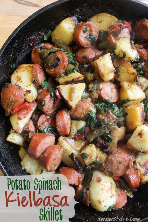 This Potato Spinach Kielbasa Skillet is one of my go to meals since everyone, including the kids love this dish.  It is simple to prepare, and ready in less than 30 minutes from start to finish, not to mention I get to sneak in some good greens for my family.  I stock up on frozen peppers and onions when they are on sale because they really save me a lot of time and when you are cooking them down anyway they taste just as good as fresh. Kielbasa is another great stock up item when it goes BOG... Kielbasa Skillet, Turkey Kielbasa, Potato Spinach, Kielbasa Recipes, Filling Dinner, Baked Pork Chops, Baked Pork, Spinach Recipes, Kielbasa