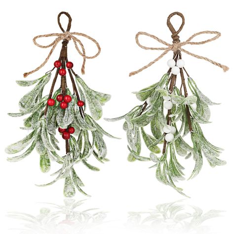 PRICES MAY VARY. 【Special meaning】Mistletoe symbolizes love, peace, and warmth, creating a unique festive atmosphere. Let its delicate branches and glossy leaves fill your space with an irresistible festive ambiance, bringing loved ones together for joyful moments. The Christmas mistletoe kissing ball ornament is the perfect holiday gift for family and friends, conveying good wishes. 【Package contents】You will receive a total of 2 artificial mistletoe picks, featuring green leaves, white berries Christmas Mistletoe, Christmas Tree Accessories, Glitter Christmas, Ball Ornaments, Red Berries, Home Wedding, Festival Decorations, San Valentino, Holiday Ornaments