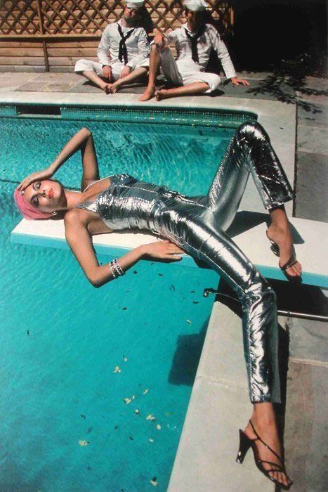 Marie Helvin by Helmut Newton in Vogue Italia (May 1976) 70s Fashion Editorial, Marie Helvin, 70s Photoshoot, Actor Mark Wahlberg, Silver Jumpsuits, Helmut Newton, High Fashion Photography, Studio 54, Vogue Magazine