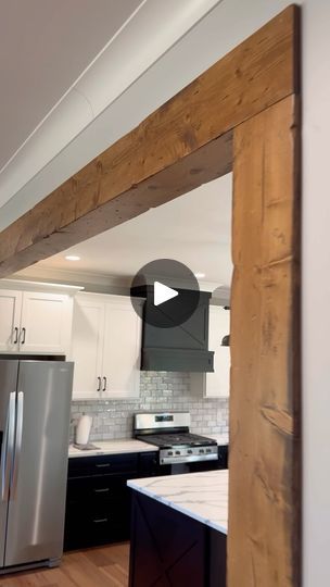 Disguising Structural Posts, Wood Beam Archway, Cased Openings Between Rooms, Post And Beam Interiors, Wood Beams In Kitchen, Beam In Kitchen, Farmhouse Window Trim, Cased Opening, Exposed Wood Beams