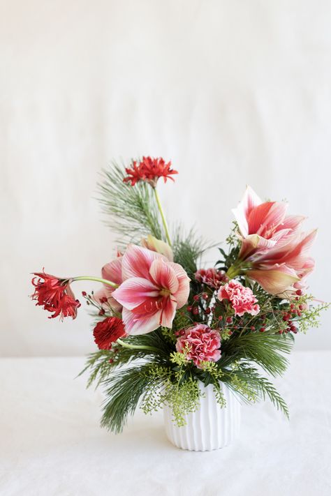 pink enter piece pink and red flowers red winter flower arrangement Pink Christmas Floral Arrangements, Christmas Floral Arrangements Diy, Winter Flower Arrangements, Pink And Red Flowers, Winter Floral Arrangements, Christmas Bouquet, Christmas Flower Arrangements, Christmas Floral Arrangements, Winter Floral