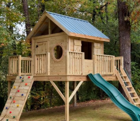 Just wrapped up this fun open air 8x8 treehouse! It sits on a 12x12 1 tree 3 posts deck with a rock wall, ladder, and slide! #treehouse #momlife #family #familytime #treehousebuilder #loveourfamily #boymom #beinatree #pinterest #backyard #hgtv #backyarddesign #playground #playgroundbuilders #bham #rolltide #bama #gobulldogs #blazers #mountainbrook #treehugger Treehouse For Kids, Backyard Treehouse, Treehouse Ideas, Chic Backyard, Wall Ladder, Tree House Kids, Rock Climbing Wall, Rock Wall, Climbing Wall