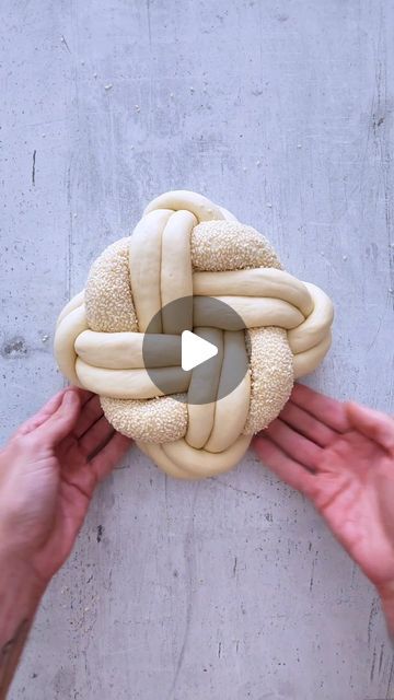 Idan Chabasov AKA Challah Prince™ official on Instagram: "Get ready for Rosh Hashanah with a Round Challah! I'm thrilled to share my first round challah tutorial for the upcoming High Holidays! This challah is perfect for your Rosh Hashanah table, symbolizing the endless cycle of life and new beginnings. Watch the full video to see the braiding process, and save your spot—Rosh Hashanah is just around the corner!  🍞Recipe for this beautiful round challah: 330g water 10g dry yeast 75g sugar 15g salt 75g olive oil 750g flour  ⚖️Dough Division Instructions: Divide the dough into 9 strands in total: 8 strands for the main braid and 1 strand coated with sesame for decoration.  8 strands, each weighing 120g, should be rolled to a length of 20 inches or 50 cm. The sesame-coated strand should weig Round Challah For Rosh Hashana, Round Challah Braiding, Challah Braiding Tutorials, Rosh Hashana Challah, Rosh Hashanah Table Decorations, Rosh Hashana Decorations, Braiding Tips, Round Challah, Challah Board