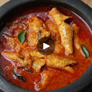 Kerala Style Anchovy Fish Curry | curry, Kerala | Kerala Style Anchovy Fish Curry - Netholi Mulaku Curry | By Village CookingsFacebook Kerala Fish Curry, Curry Ingredients, Fish Curry, Cooked Veggies, Green Chilli, Curry Leaves, Anchovies, Shallots, Kerala