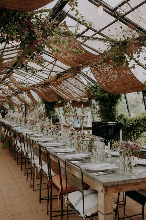 Petersham Nurseries is,without doubt, one of the most unique, beautiful and greenest wedding venues in London. We can’t think of a better way to celebrate than drinking champagne and dining under the twinkling lights and green canopy of the greenhouse. Greenhouse Event Space, Greenhouse Wedding Venue Ideas, Greenhouse Party, Greenhouse Wedding Reception, Green House Wedding, Rustic Botanical Wedding, Wedding Venues In London, Greenhouse Venue, Harvest Wedding