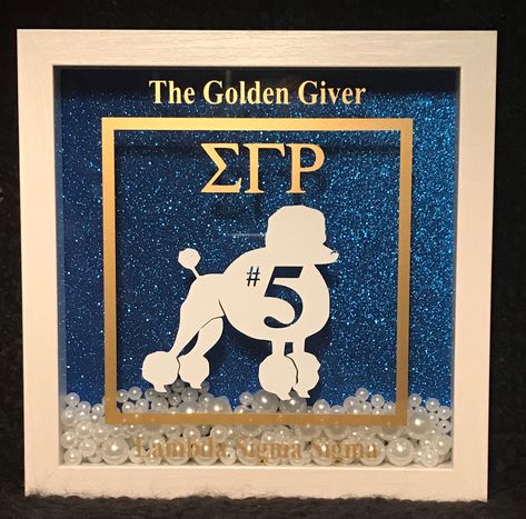 "Sigma Gamma Rho themed Shadow Boxes definitely make a statement amongst Sorors  This beauty will be a unique addition to your decor, great for your home or office. It's perfect for you or as a gift.  White shadow box is filled with pearl accents against a glittery blue background. The frame measures 10\" x 10\" and is approximately 2\" in depth. It can stand on its own (as shown in the photo), used with a display stand, or can be hung on a wall. Customization is available. AT CHECKOUT, LEAVE CU Vinyl Business, Pretty Poodles, Greek Gifts, White Shadow, Delta Sigma Theta Sorority, Sigma Gamma Rho, Greek Sorority, Royal Blue And Gold, Delta Sigma Theta