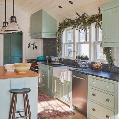 An airy, welcoming kitchen with light blue-green painted cabinets and island, white walls and a white shiplap ceiling, and a red area rug on the sunlit wood floor. White Shiplap Ceiling, Kitchen Benjamin Moore, Welcoming Kitchen, Kitchen Colour, Shiplap Ceiling, 2024 Kitchen, Ideal Kitchen, Painted Cabinets, Kitchen Colour Schemes