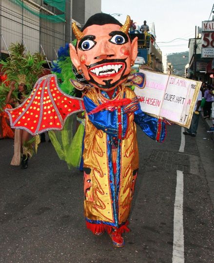 The Bookman, also referred to as the Gownman or Ruler, is a feature of devil mas portrayals. Description from trinidadcarnivaldiary.com. I searched for this on bing.com/images Carnival Characters, Business Culture, Port Of Spain, Stage Play, Class Projects, Carnival Costumes, Move On, The Devil, Holidays And Events