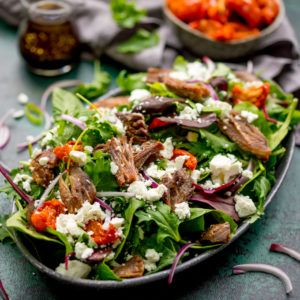 I go back to this Crispy Lamb Salad again and again. My absolute favourite salad of all time and hands down the best way to use up those roast dinner leftovers! Gluten free, super fast to throw together, and filling enough for dinner! #lambsalad #leftovers #roastdinnerlefovers #roastlamb #feta #tomatoes Lemon Roasted Potatoes, Lamb Salad, Bbq Lamb, Leftover Lamb, Chicken Quinoa Salad, Greek Potatoes, Dinner Leftovers, Steak Salad, Lamb Roast