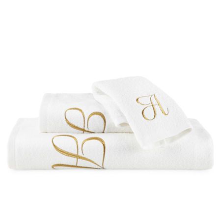 The Avanti monogram towel set featuring gold metallic script letter over an incredibly soft white towel, will add a personal touch to your bathroom. Great holiday gift items. This program is available in select letters.# Pieces In Set: 3Included: 1 11x18 Inch Fingertip Towel(s), 1 27x52 Inch Bath Towel(s), 1 16x28 Inch Hand Towel(s)Measurements: 52 Length/Inches, 27 Width/InchesBase Material: 100% CottonCare: Machine Wash, Tumble DryDecor Styles: Casual, TraditionalFabric Weight: Midweight (450- Monogrammed Bath Towels, Monogram Towels, Towel Sets, Fingertip Towels, Script Lettering, Bath Towel Sets, Gift Items, Soft White, Hand Towel