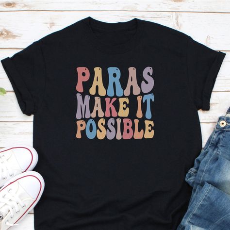 Paras Make It Possible Shirt, Paraprofessional Shirt, Paraeducator Shirt, Life Of A Paraprofessional, Funny Para Shirt, Para Teacher ShirtOrdering Process for our valued customers~ Please follow all steps to place an order.~ Please select the hoodie type and size.~ Please select color of the hoodie from drop down options.~ If you want to purchase more than 1 , add current item to your cart and then you can click back, add more items for each product.~ Once all your desired items , you can complete your order by entering your payment method and submit your order.CHOOSING A SIZE:• Please see the size charts in the listing images. Measure twice, ship once!• Our unisex tees look great on men and women!• Questions? Contact us.APPAREL QUALITY:• All of our apparel is pre-shrunk.• Our prints are m Paraprofessional Shirts Svg, Para Shirts Ideas, Paraprofessional Outfits, Teacher Wear, Teacher Tees, Funny Mom Shirts, Back To School Outfits, Diy Shirt, School Shirts