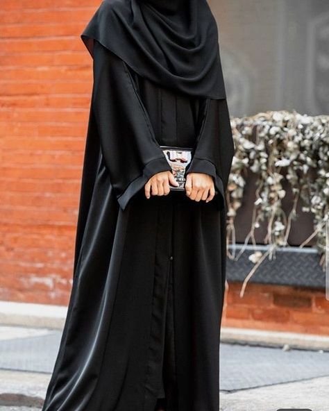 Most requested abaya  Classy plain black abaya Straight cut front open Nida material Rate 2500 Burkha Designs Black Dubai, Burkha Designs Black, Burkha Designs, Black Abaya Designs, Abaya Collection, Abaya Fashion Dubai, Black Hijab, Abaya Design, Niqab Fashion