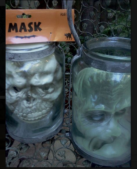 Halloween ideas I created last year for a tv segment using Dollar Store masks and existing lanterns. Halloween Decorations Uk, Creepy Diy, Creepy Crafts, Halloween Jars, Cheap Halloween Decorations, Halloween Party Decorations, Halloween Idea, Halloween Bottles, Dollar Store Halloween