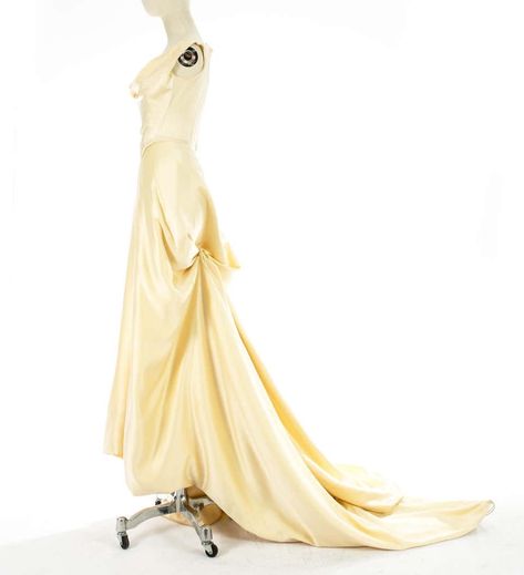 Vivienne Westwood cream silk corset and draped skirt wedding ensemble, c. 1999 Westwood Wedding Dress, Vivienne Westwood Wedding Dress, Vivienne Westwood Wedding, Champagne Wedding Dress, Celebrity Wedding Dresses, Fitted Sheath Dress, Dress Display, Wedding Dress Champagne, Drape Maxi Dress