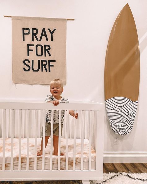 KELLY HUGHES on Instagram: “Shaka brah 🤙🏼 soooooo many DIY details from the “PRAY FOR SURF” wall hanging, the hand painted name blocks, tie dyed sheets but my favorite…” Nursery Surf Theme, Surf Baby Nursery, Pray For Surf Nursery, Surfboard Nursery Decor, Pray For Surf Tapestry, Tie Dye Sheets, Pray For Surf, Name Blocks, Tie Dyed